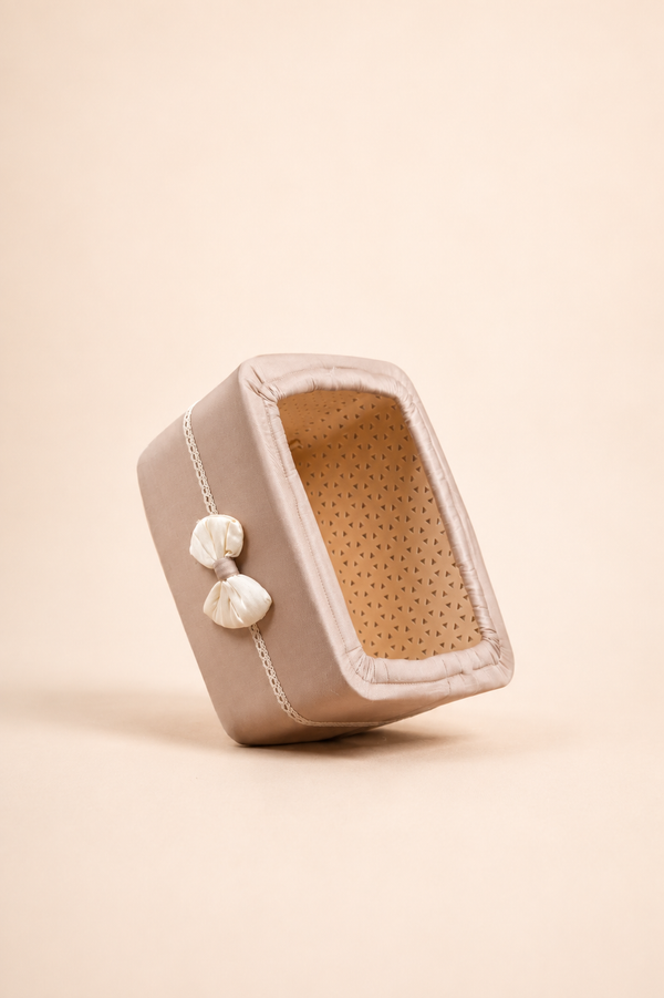 Small rectangular basket, mauve cotton lining, angled view